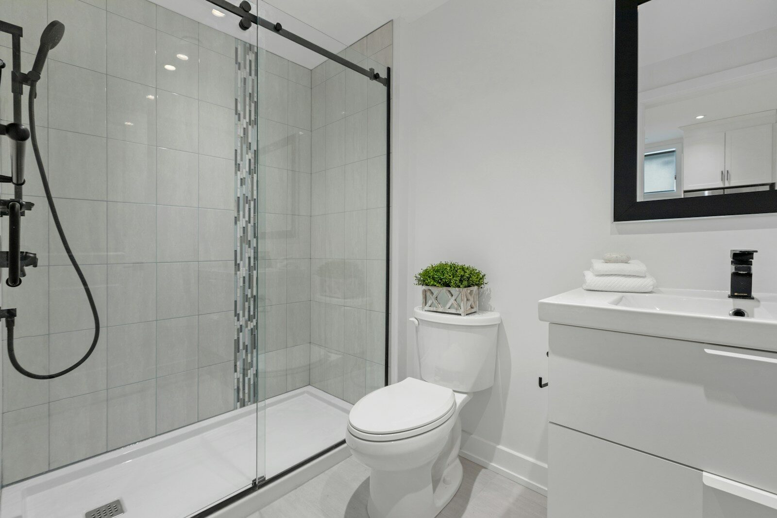 a bathroom with a glass shower